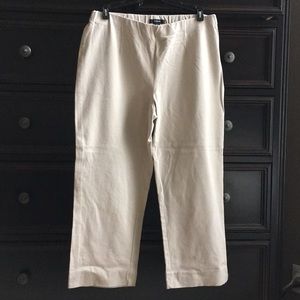 Women’s beige crop pants with stretch.